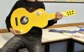 Creazione di un prototipo di chitarra con utilizzo di materiale di riciclo e utilizzo di sensori SamLabs per mettere suoni ed effetti luminosi.